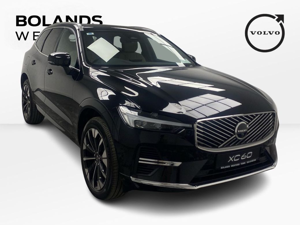 Image for 2026 Volvo XC60 Plus model in Onyx Black with the Cardamon interior