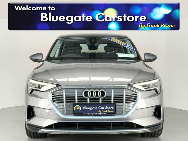 Image for 2022 Audi e-tron TECHNIK 55 QUATTRO**NEW 22"ALLOYS**BLACK LEATHER INTERIOR**FRONT HEATED ELECTRIC SEATS**TOUCH SCREEN INFOTAINMENT**REVERSE CAMERA**PARKING SENSORS*DUAL CLIMATE CONTROL*APPLE CARPLAY*ELECTRIC TAILGATE*