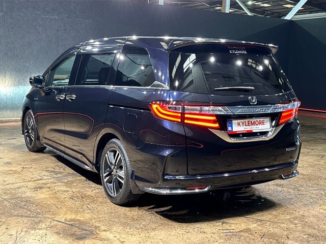 Image for 2016 Honda Odyssey 2.0 HYBRID AUTOMATIC 7 SEATER - FACTORY ALLOYS - BLACK LEATHER UPHOLSTERY - HEATED ELECTRIC SEATS - POWER SLIDING DOORS - 360/REVERSE CAMERA - CRUISE CONTROL