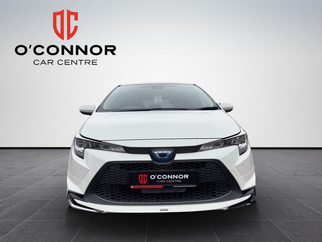 Image for 2020 Toyota Corolla "Pearl white with plenty of life — the hybrid that keeps giving, mile after mile"