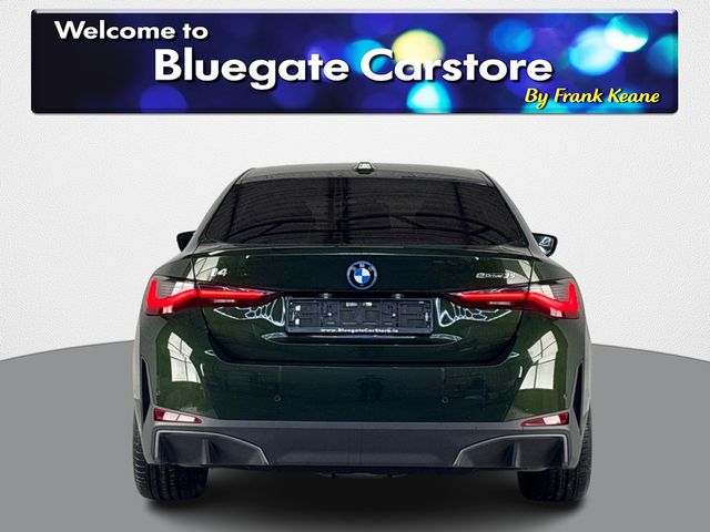 Image for 2024 BMW i4 EDRIVE35 SPORT **RED AND BLACK FULL LEATHER INTERIOR**FRONT HEATED SEATS**REVERSE CAMERA**FULL DIGITAL DASH**APPLE CARPLAY**ANDROID AUTO**DRIVE MODES**TOUCHSCREEN INFOTAINMENT SYSTEM**PARKING SENSORS