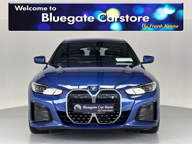 Image for 2022 BMW i4 EDRIVE40 M SPORT **LEATHER HEATED SEATS**MULTIFUNCTIONAL STEERING WHEEL**FULL DIGITAL DASH**CRUISE CONTROL**APPLE CAR PLAY**DRIVE MODES**AUTO LIGHTS**AUTO HOLD**ELECTRIC TAILGATE**ISOFIX**