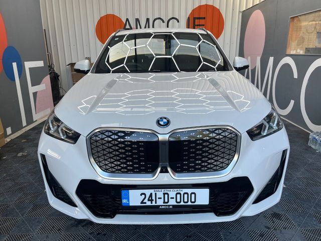 Image for 2024 BMW iX1 2024 BMW IX1 4WD XDRIVE 30 M-SPORT 11K KM AUTOMATIC/ CRUISE CONTROL / PARKINNG CAMERA / ELECTRIC MEMORY & HEATED SEATS / AMBIENT LIGHTS / PADDLE SHIFTERS AND MORE