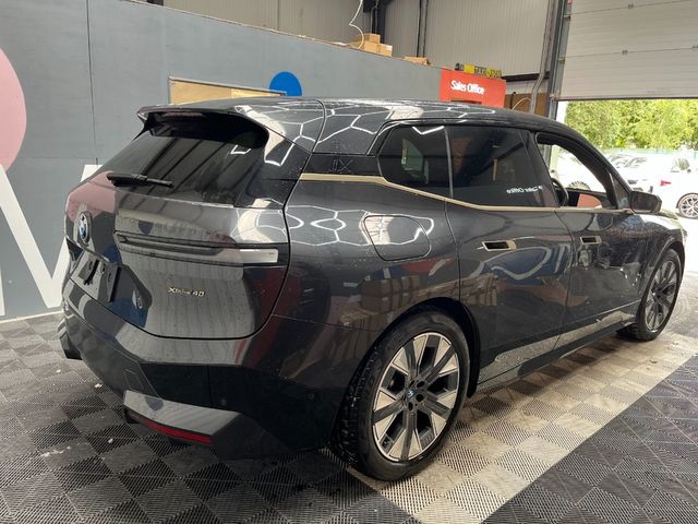 Image for 2023 BMW iX 2023 BMW IX XDRIVE40 LAUNCH EDITION AUTOMATIC / CRUISE CONTROL / PARKING CAMERA / ELECTRIC MEMORY & HEATED SEATS / PANORAMIC SUNROOF / HEATED STEERING WHEEL / APPLE CARPLAY / AMBIENT LIGHTS AND MORE