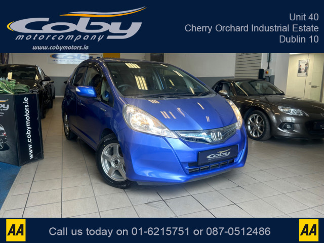 Image for 2013 Honda Fit 1.3 HYBRID 5DR AUTO 1.3. New NCT, 2 Keys, Alloy Wheels, Sat Nav, Cruise Control, Air Conditioning, Parking Sensors, Full Electrics, Bluetooth, Car Play, Folding Rear Seats, Luggage Cover and more