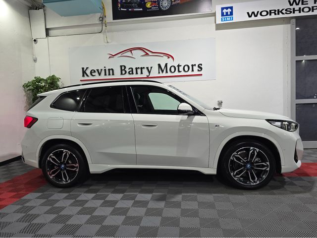 Image for 2023 BMW iX1 30 M SPORT X-DRIVE AUTOMATIC **ONE OWNER / TOP SPEC / APPLE CARPLAY / COMFORT ACCESS / ELECTRIC BOOTLID / HEATED FRONT SEATS / REVERSE CAMERA / WIRELESS PHONE CHARGING / BMW WARRANTY UNTIL 12/2026**