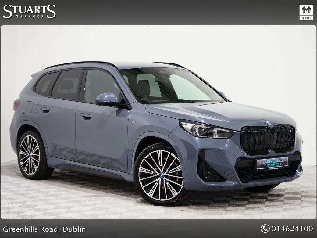 Image for 2023 BMW iX1 30e X-DRIVE M-SPORT *PRO PACK WITH TECH PACK AND COMFORT PACKS*: FINISHED IN STORM BAY METALLIC WITH BLACK HALF LEATHER, 20” DIAMOND CUT ALLOYS. 