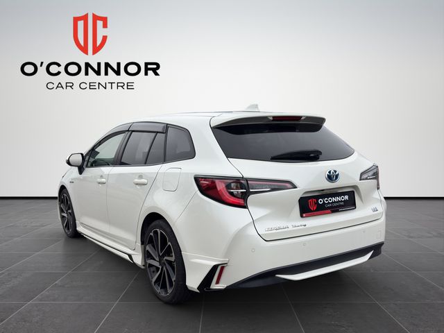 Image for 2020 Toyota Corolla "Pearl white with plenty of life — the hybrid that keeps giving, mile after mile"