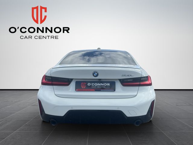 Image for 2024 BMW 3 Series White outside, Tacora Red inside — subtle was never the plan.