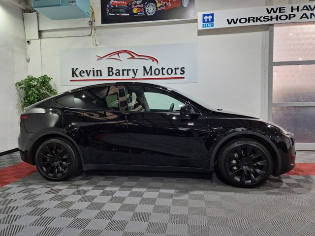 Image for 2024 Tesla Model Y RWD AUTOMATIC **20" TURBINE ALLOYS / ADAPTIVE CRUISE CONTROL / BLIND SPOT ASSIST / ELECTRIC BOOTLID / FULL LEATHER / HEATED F&R SEATS / REVERSE CAMERA / WIRELESS PHONE CHARGING / TESLA WARRANTY**