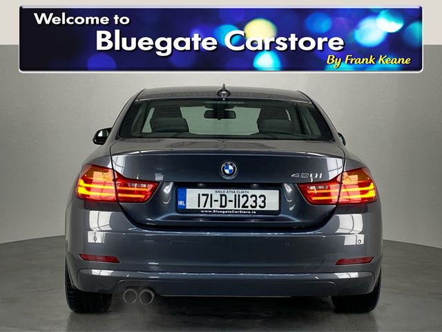 Image for 2017 BMW 4 Series 420I**NEW 19" ALLOYS **Parking Sensors**Sat Navigation**Black Leather Interior**Heated Seats**Foldable Mirrors**Air Conditioning**Multifunctional Steering Wheel**Isofix**Finance Available**