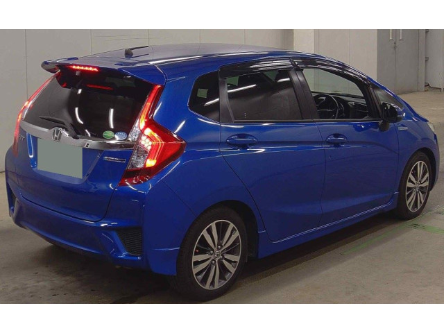 Image for 2014 Honda Fit Honda Fit Hybrid JDM 5-door hatchback with Honda’s efficient 1.5 petrol-hybrid system.