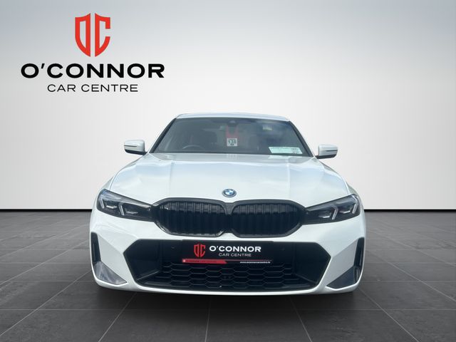 Image for 2024 BMW 3 Series White outside, Tacora Red inside — subtle was never the plan.