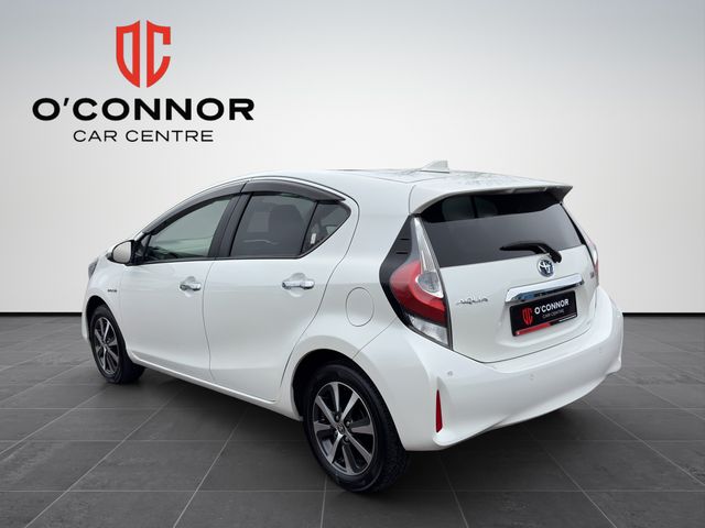 Image for 2018 Toyota Aqua "White, wise and wickedly efficient — the hybrid that makes every mile feel easy"