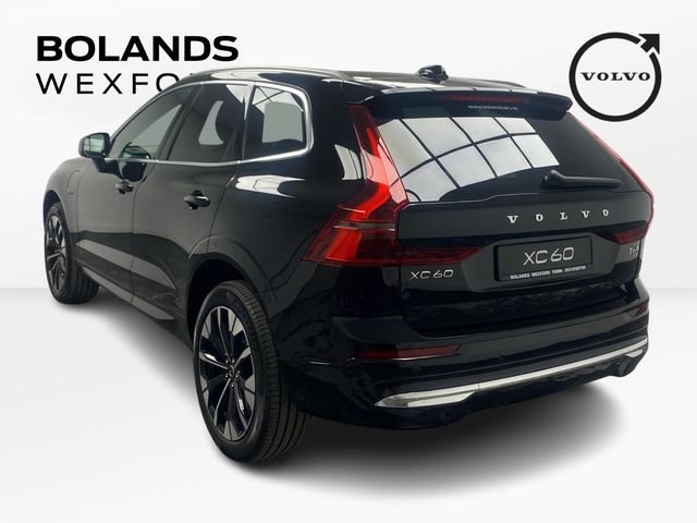 Image for 2026 Volvo XC60 Plus model in Onyx Black with the Cardamon interior