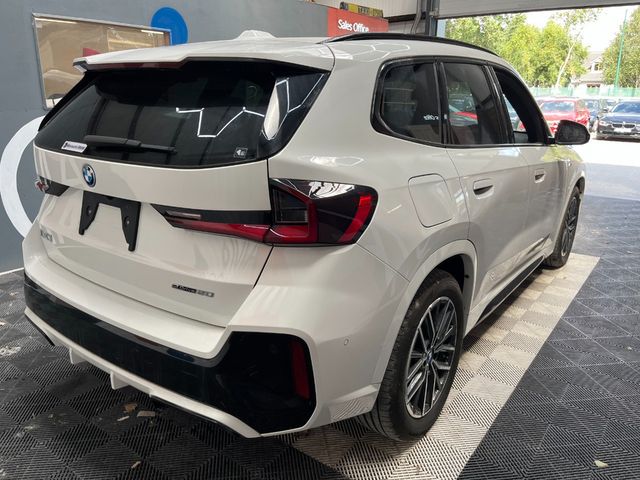 Image for 2024 BMW iX1 2024 BMW IX1 EDRIVE20 AUTOMATIC / CRUISE CONTROL / PARKINNG CAMERA / ELECTRIC MEMORY & HEATED SEATS / AMBIENT LIGHTS / PADDLE SHIFTERS AND MORE