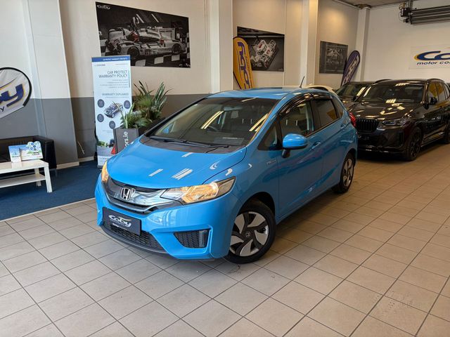 Image for 2015 Honda Fit 1.5 Petrol HYBRID 5DR AUTO. Immaculate Car with only 95km, 2 Keys, NCT done before collection, Mirror Link, Climate Control, Cruise Control, Full Electrics and much more.