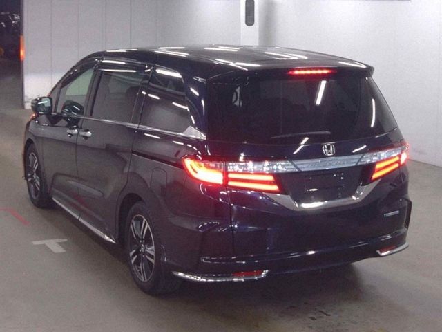 Image for 2016 Honda Odyssey 2.0 HYBRID AUTOMATIC 8 SEATER - FACTORY ALLOYS - BLACK LEATHER UPHOLSTERY - HEATED SEATS - POWER SLIDING DOORS - 360 CAMERA