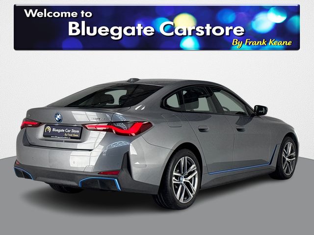 Image for 2024 BMW i4 EDRIVE35 SPORT**HARMON KARDON SOUND SYSTEM**HALF LEATHER INTERIOR**FRONT HEATED SEATS**REVERSE CAMERA**PARKING SENSORS**APPLE CARPLAY**DRIVE MODES**KEYLESS START**MULTIFUNCTIONAL STEERING WHEEL**