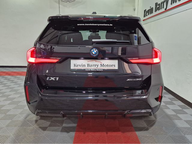 Image for 2023 BMW iX1 30 M SPORT (PRO PACK) X-DRIVE AUTOMATIC **ONE OWNER / 20" IND ALLOYS / ADAPTIVE LED HEADLIGHTS / COMFORT ACCESS / HARMAN KARDON SOUND / REVERSE CAMERA / WIRELESS PHONE CHARGING / BMW SERVICE PACK**