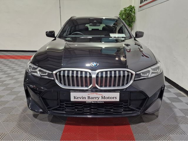 Image for 2025 BMW 3 Series 330E TOURING M SPORT (22.3KWH BATTERY) AUTOMATIC **ONE OWNER / APPLE CARPLAY / CRUISE CONTROL / ELECTRIC BOOTLID / FULL LEATHER / HEATED SEATS / REVERSE CAMERA / SAT NAV / BMW WARRANTY UNTIL 03/2028**
