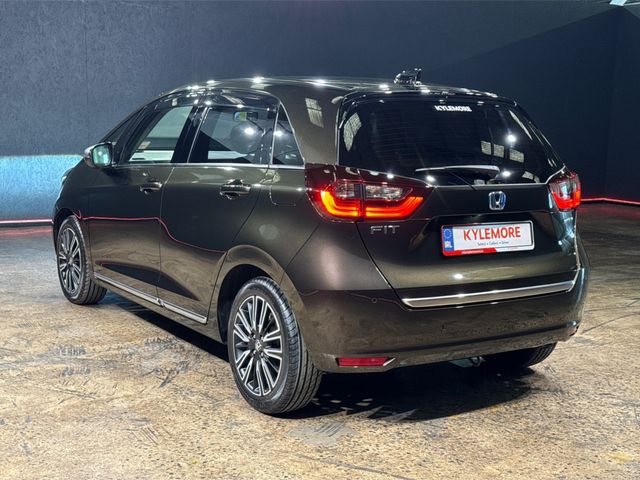 Image for 2021 Honda Fit 1.5 HYBRID LUXURY EDITION - BLACK HALF LEATHER - UPGRADED FACTORY ALLOYS - CRUISE CONTROL - HEATED SEAT - REAR CAMERA