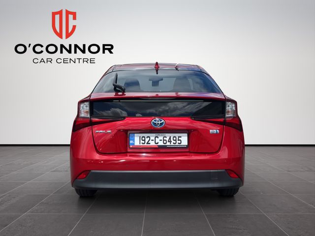 Image for 2019 Toyota Prius Red Prius energy — passing petrol stations like they offended you