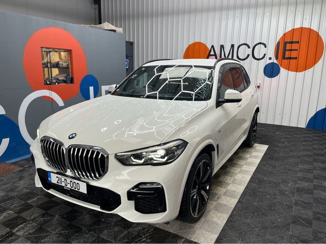 Image for 2021 BMW X5 €53950 2021 BMW X5 XDRIVE 45E M-SPORT 2.0 AUTOMATIC / CRUISE CONTROL / 360° CAMERA / ELECTRIC MEMORY & HEATED SEATS / AMBIENT LIGHTS / PADDLE SHIFTERS / PANORAMIC SUNROOF AND MORE