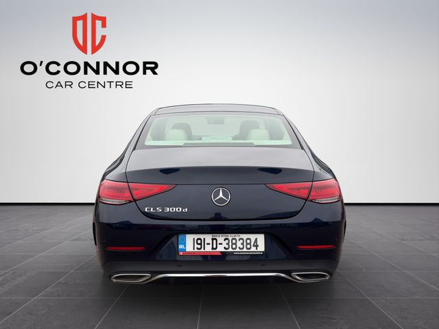 Image for 2019 Mercedes-Benz CLS Class "Blue beauty outside, white luxury inside — this CLS is pure class in motion"