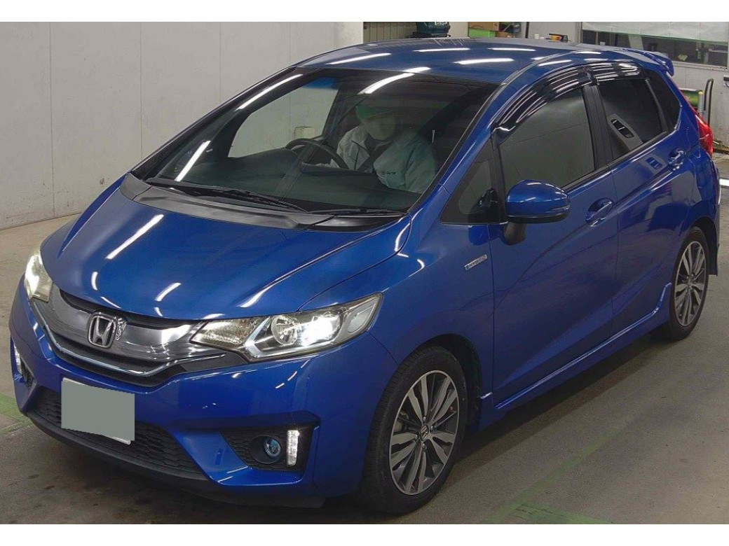 Image for 2014 Honda Fit Honda Fit Hybrid JDM 5-door hatchback with Honda’s efficient 1.5 petrol-hybrid system.
