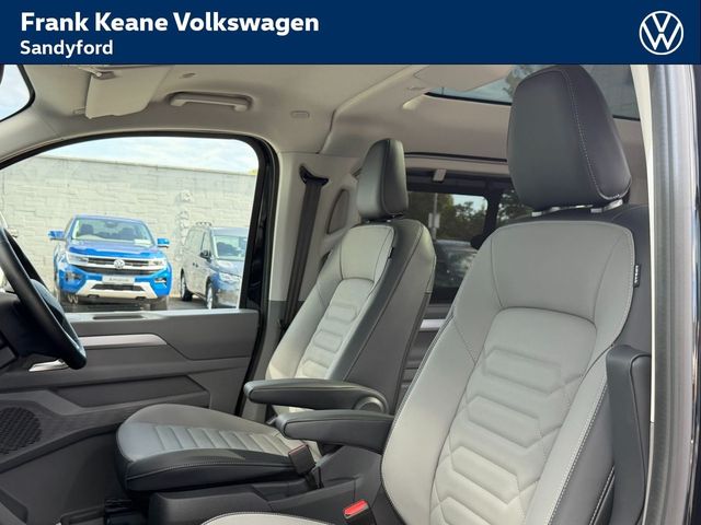Image for 2026 Volkswagen Caravelle STYLE AUTO PLUG-IN HYRBID *17" MONTE CARLO ALLOYS* *IQ LED MATRIX HEADLIGHTS* *LEATHER INTERIOR* *360 AREA VIEW CAMERA* *APPLE CARPLAY/ANDROID AUTO* *HEATED SEATS*