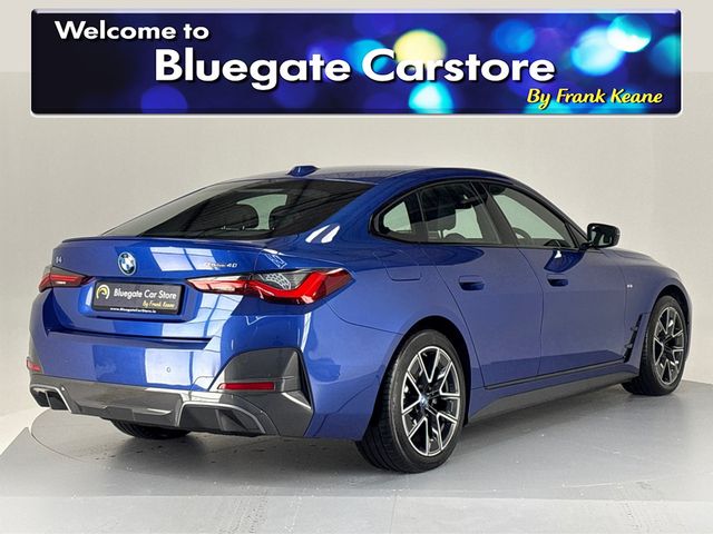 Image for 2022 BMW i4 EDRIVE40 M SPORT **LEATHER HEATED SEATS**MULTIFUNCTIONAL STEERING WHEEL**FULL DIGITAL DASH**CRUISE CONTROL**APPLE CAR PLAY**DRIVE MODES**AUTO LIGHTS**AUTO HOLD**ELECTRIC TAILGATE**ISOFIX**