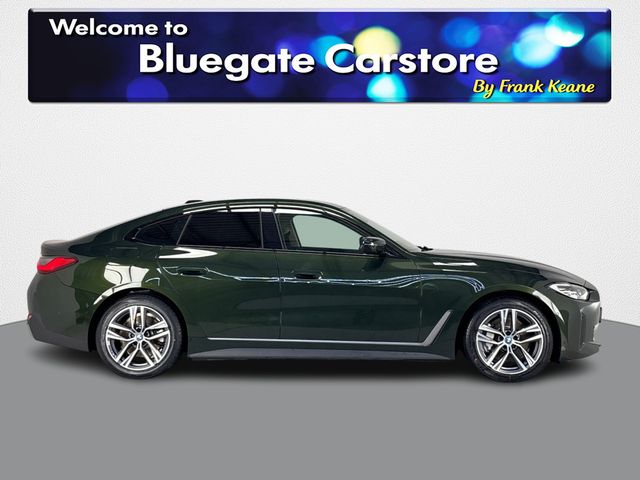 Image for 2024 BMW i4 EDRIVE35 SPORT **RED AND BLACK FULL LEATHER INTERIOR**FRONT HEATED SEATS**REVERSE CAMERA**FULL DIGITAL DASH**APPLE CARPLAY**ANDROID AUTO**DRIVE MODES**TOUCHSCREEN INFOTAINMENT SYSTEM**PARKING SENSORS