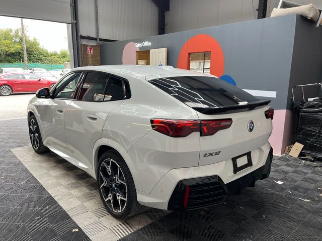 Image for 2024 BMW iX2 2024 BMW IX2 XDRIVE30 AUTOMATIC / CRUISE CONTROL / PARKING CAMERA / ELECTRIC MEMORY & HEATED SEATS / PANORAMIC SUNROOF / PADDLE SHIFTERS / AMBIENT LIGHTS AND MORE