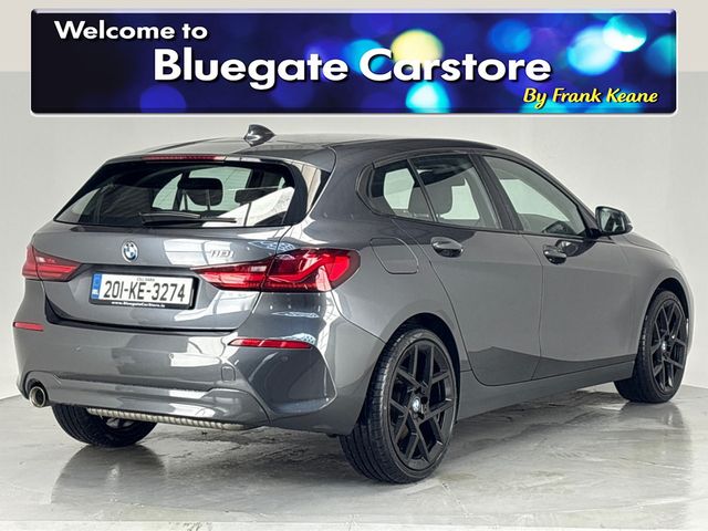 Image for 2020 BMW 1 Series 118i *New 19" Alloys*Surround Parking Sensors*Multimedia Touchscreen Infotainment System*Sat-Nav*Cruise Control*Automatic Headlights*Drive Select Modes*NEW: 19” Gloss Black Alloy Wheels*