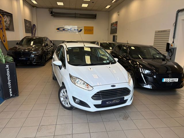 Image for 2017 Ford Fiesta MCA Titanium 1.25 60PS M5 4DR Irish Owned Car With NCT & Tax, Parking Sensor, CD Player, 2 Keys, Air Conditioning, Irish Radio, Service History, Folding Rear Seats, Alloy Wheels, and more.