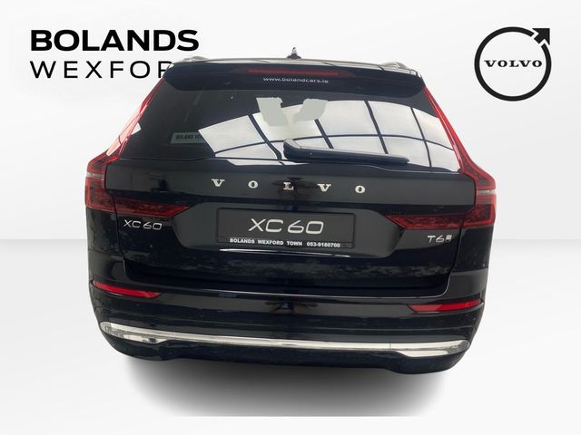 Image for 2026 Volvo XC60 Plus model in Onyx Black with the Cardamon interior
