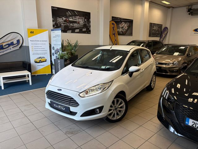 Image for 2017 Ford Fiesta MCA Titanium 1.25 60PS M5 4DR Irish Owned Car With NCT & Tax, Parking Sensor, CD Player, 2 Keys, Air Conditioning, Irish Radio, Service History, Folding Rear Seats, Alloy Wheels, and more.