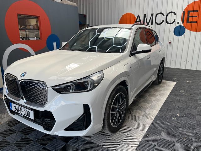 Image for 2024 BMW iX1 2024 BMW IX1 EDRIVE20 AUTOMATIC / CRUISE CONTROL / PARKINNG CAMERA / ELECTRIC MEMORY & HEATED SEATS / AMBIENT LIGHTS / PADDLE SHIFTERS AND MORE