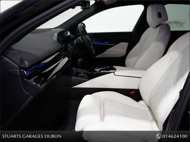 Image for 2025 BMW i5 **TECH PACK, 20” ALLOYS** , 570KM CLAIMED RANGE, CARBON BLACK METALLIC, IVORY VEGANZA INTERIOR WITH DARK ASH WOOD