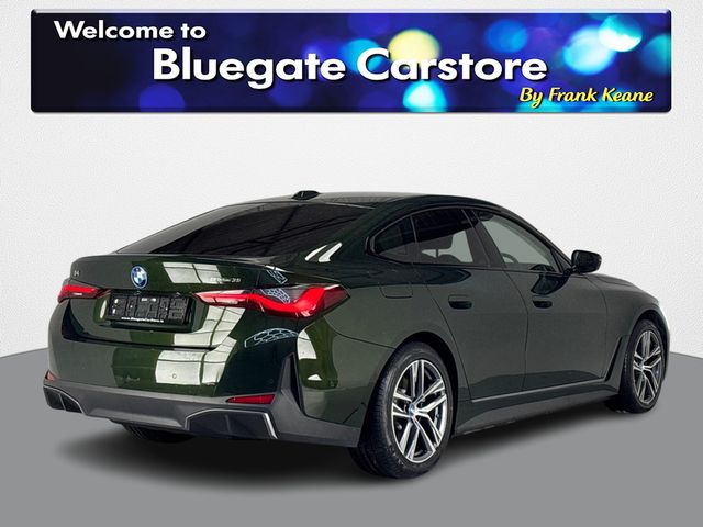 Image for 2024 BMW i4 EDRIVE35 SPORT **RED AND BLACK FULL LEATHER INTERIOR**FRONT HEATED SEATS**REVERSE CAMERA**FULL DIGITAL DASH**APPLE CARPLAY**ANDROID AUTO**DRIVE MODES**TOUCHSCREEN INFOTAINMENT SYSTEM**PARKING SENSORS
