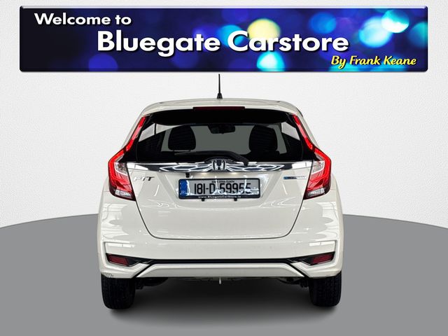 Image for 2018 Honda Fit TOUCHSCREEN DISPLAY**MEDIA CONNECTIVITY**KEYLESS START**REVERSE CAMERA**PARKING SENSORS**CRUISE CONTROL**SEMI DIGITAL DASH**LANE ASSIST**EMERGENCY BRAKE ASSIST**AIR CONDITIONING**ELECTRIC WINDOWS**