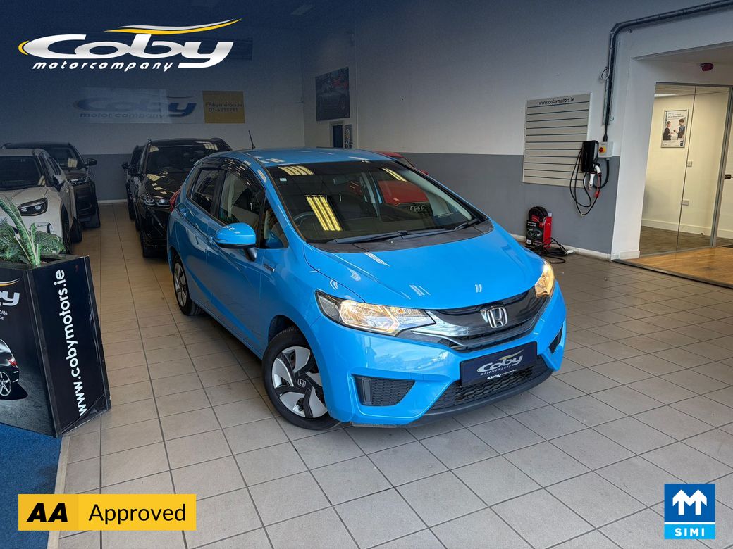 Image for 2015 Honda Fit 1.5 Petrol HYBRID 5DR AUTO. Immaculate Car with only 95km, 2 Keys, NCT done before collection, Mirror Link, Climate Control, Cruise Control, Full Electrics and much more.