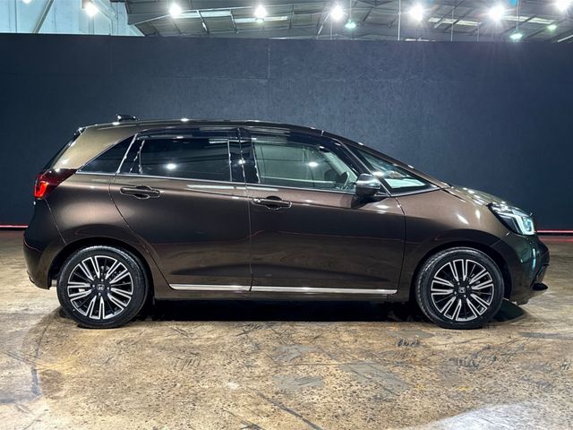 Image for 2021 Honda Fit 1.5 HYBRID LUXURY EDITION - BLACK HALF LEATHER - UPGRADED FACTORY ALLOYS - CRUISE CONTROL - HEATED SEAT - REAR CAMERA