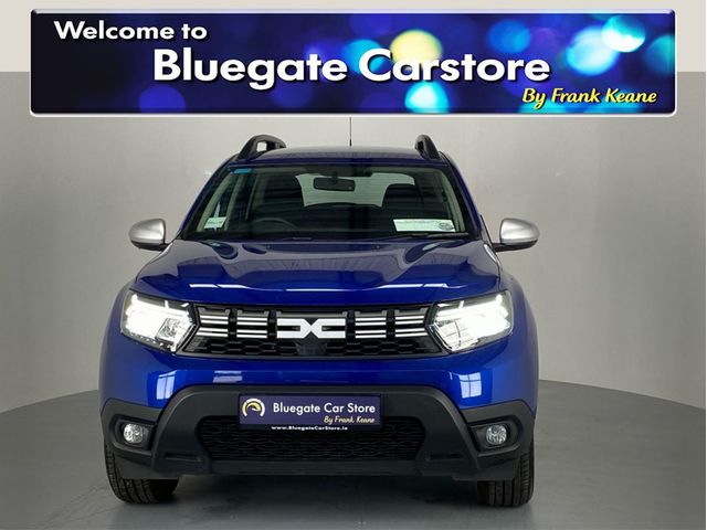 Image for 2023 Dacia Duster EXPRESSION BLUE**Semi Digital Dash**Reverse Camera**Apple CarPlay**Touchscreen Media**Multifunctional Steering Wheel**Black Cloth Interior**Cruise Control**Automatic Headlights**Bluetooth Connection**