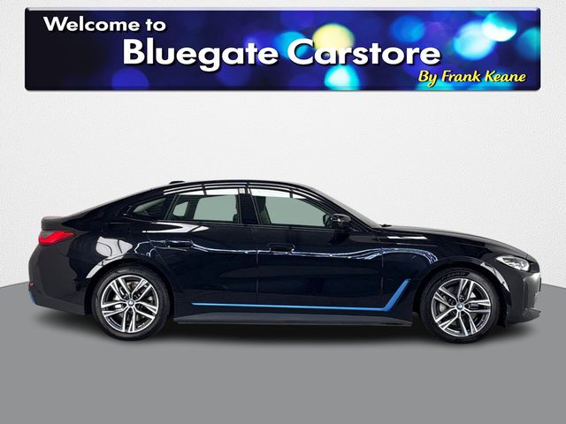 Image for 2024 BMW i4 EDRIVE35 SPORT **FULL BLACK HALF LEATHER INTERIOR**FRONT HEATED SEATS**ANDROID AUTO**APPLE CARPLAY**TOUCHSCREEN INFOTAINMENT SCREEN**DIGITAL DASH**CRUISE CONTROL**SPEED LIMITER**USB CHARGING PORTS**