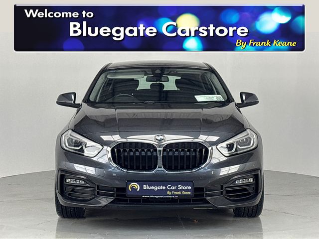 Image for 2020 BMW 1 Series 118i *New 19" Alloys*Surround Parking Sensors*Multimedia Touchscreen Infotainment System*Sat-Nav*Cruise Control*Automatic Headlights*Drive Select Modes*NEW: 19” Gloss Black Alloy Wheels*