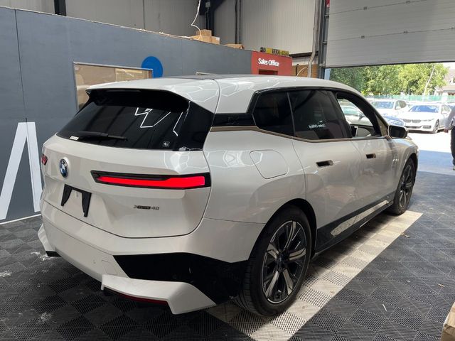 Image for 2022 BMW iX 2022 BMW IX AUTOMATIC / CRUISE CONTROL / PARKING CAMERA / ELECTRIC MEMORY & HEATED SEATS / PANORAMIC SUNROOF / HEATED STEERING WHEEL / APPLE CARPLAY AND MORE