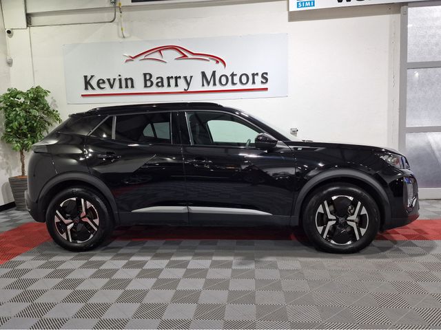 Image for 2024 Peugeot 2008 EV GT (50KWH BATTERY) AUTOMATIC **ONE OWNER / TOP SPEC / APPLE CARPLAY / CRUISE CONTROL / HALF LEATHER / KEYLESS ENTRY / REVERSE CAMERA / WIRELESS PHONE CHARGING / PEUGEOT WARRANTY 03|2027**