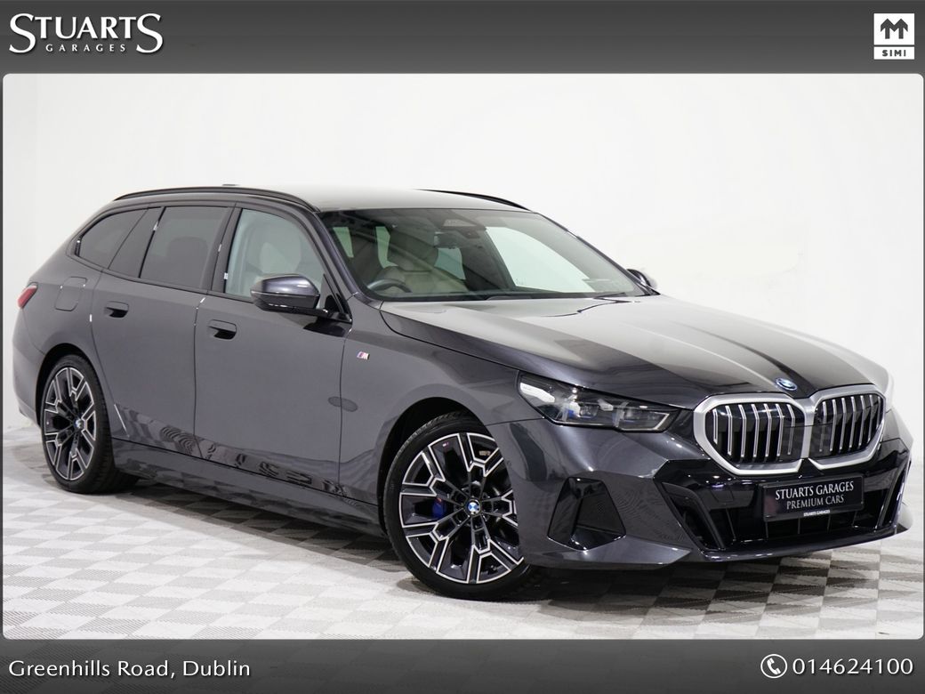 Image for 2025 BMW 5 Series *PANORAMIC SUNROOF, TECH PACK AND 20” 939 ALLOYS* SOPHISTO GREY METALLIC WITH IVORY VEGANZA INTERIOR. 530e TOURING M-SPORT
